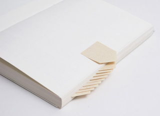Illustration for article titled This New Design for the Post-it Could Solve the Post-it's Classic Problem